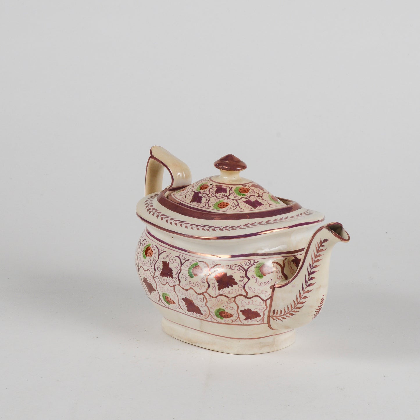 Teiera in ceramica smaltata finitura a lustro XX secolo