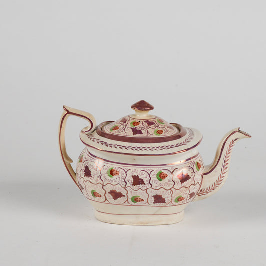 Teiera in ceramica smaltata finitura a lustro XX secolo