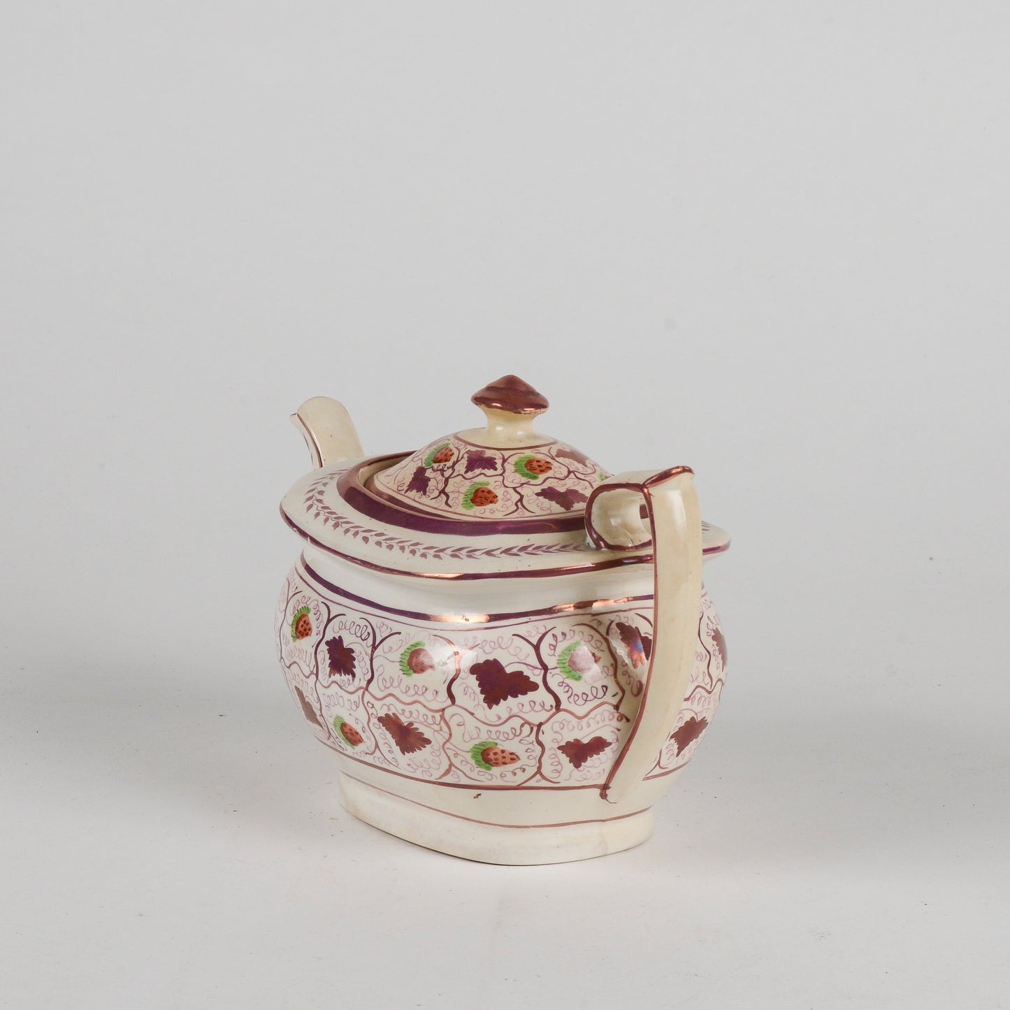 Teiera in ceramica smaltata finitura a lustro XX secolo