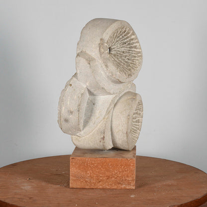 scultura in pietra firmata LB