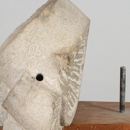 scultura in pietra firmata LB
