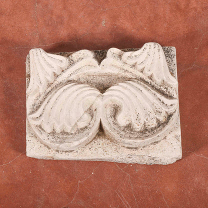 Frammento in pietra decoro da parete
