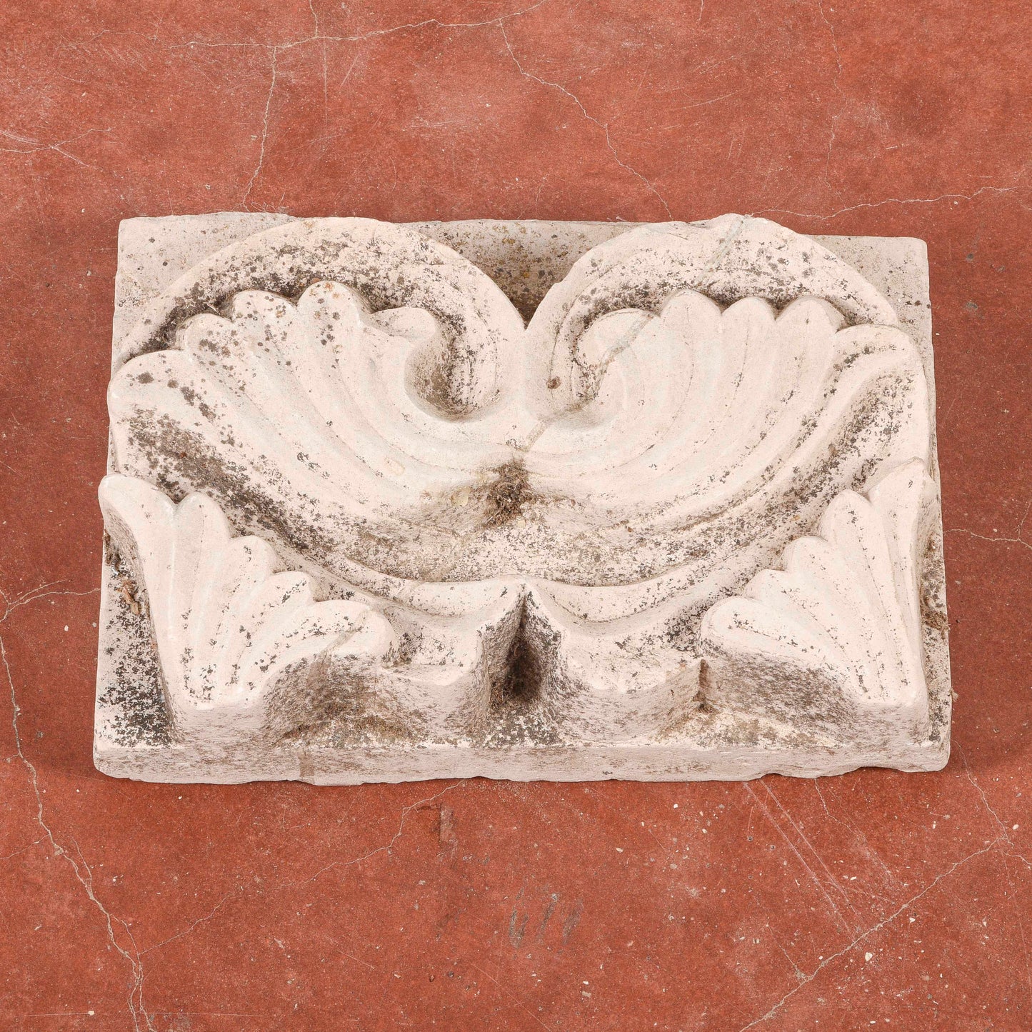 Frammento in pietra decoro da parete
