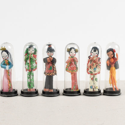 set collezione di 11 bamboline orientali sotto teca