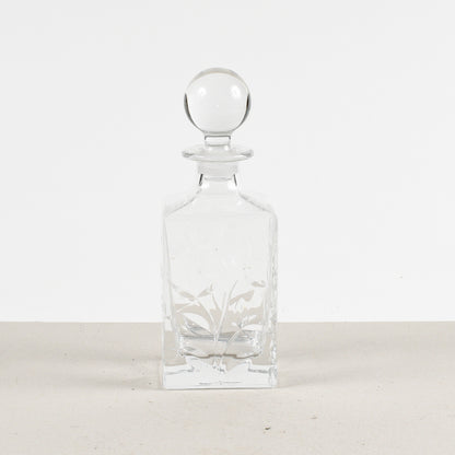 bottiglia da wisky con decoro di foglie a ramo in vetro