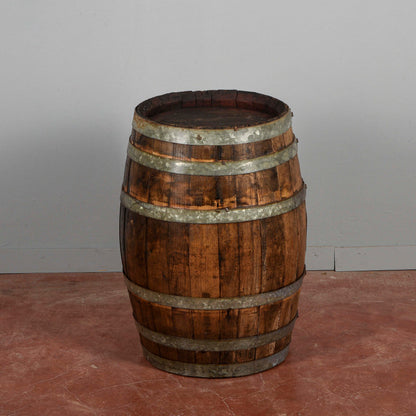 Piccola botte da vino con doghe di legno e fasce metallo XX secolo