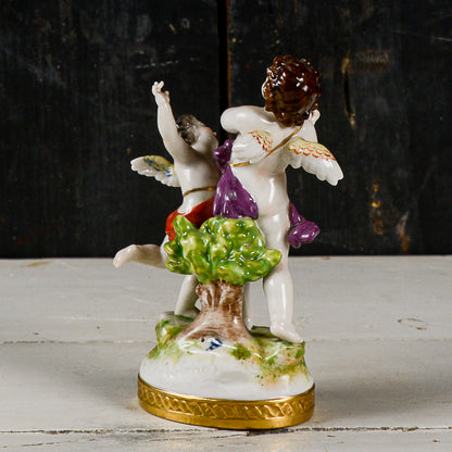 Statua scultura capodimonte putti musicisti danzanti con cembalo