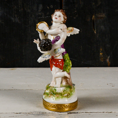 Statua scultura capodimonte putti musicisti danzanti con cembalo