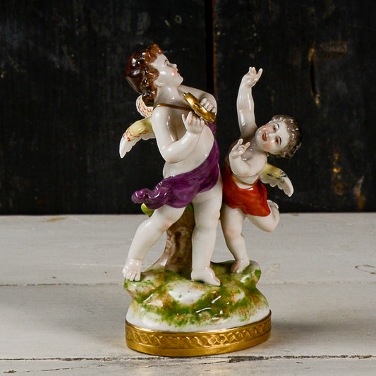 Statua scultura capodimonte putti musicisti danzanti con cembalo