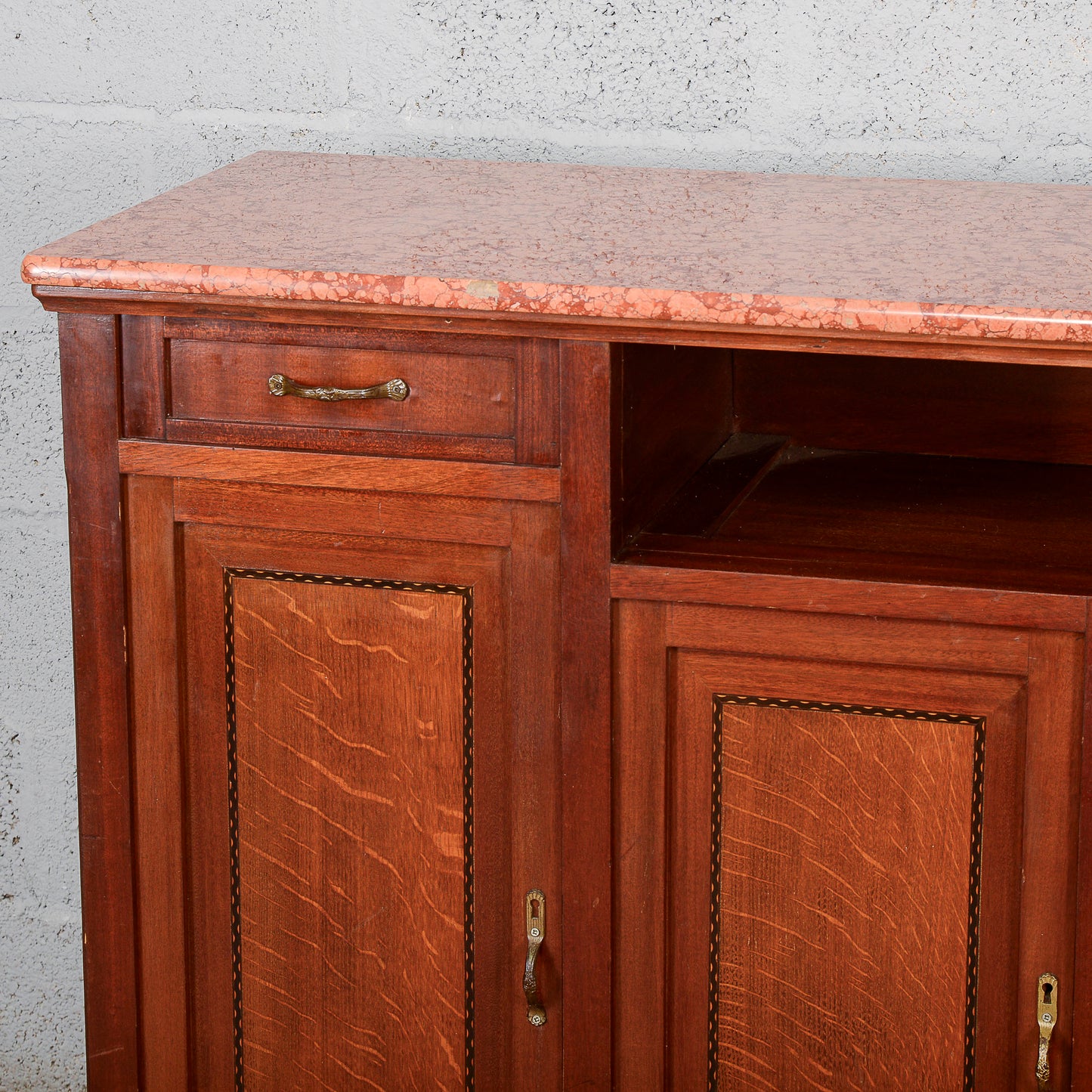 Credenza 4 ante e vano a giorno piano marmo