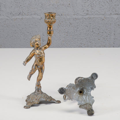 Coppia candelieri putti in metallo XX secolo