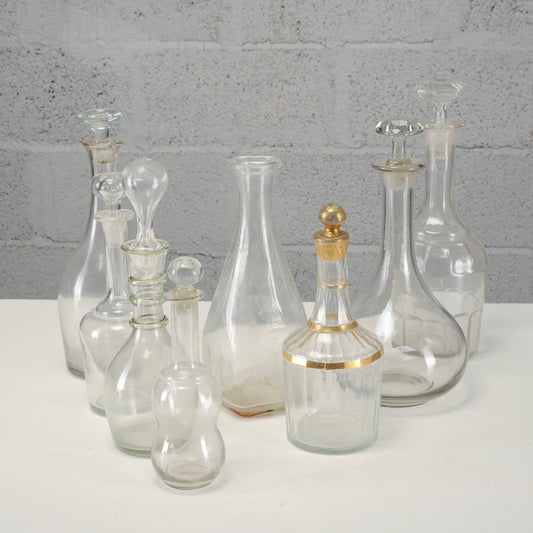 Serie di bottiglie varie decanter, in vetro lavorato XX secolo