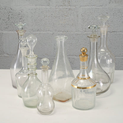 Serie di bottiglie varie decanter, in vetro lavorato XX secolo