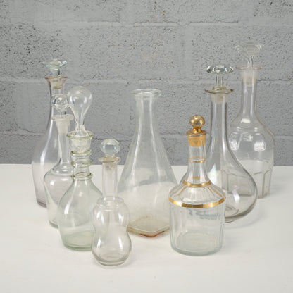 Serie di bottiglie varie decanter, in vetro lavorato XX secolo