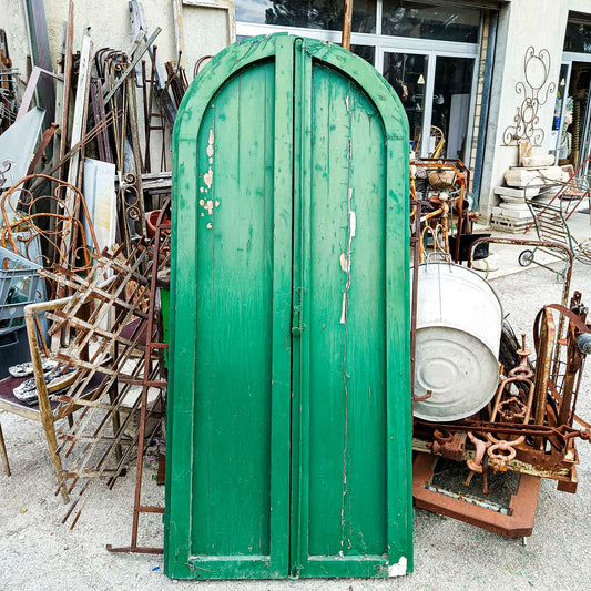 Porta a due ante stondata in abete verniciata verde XX secolo