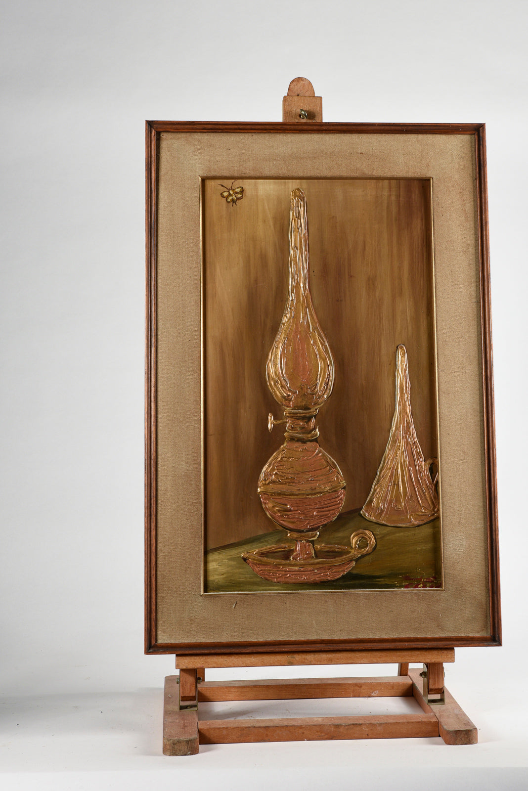 Quadro materico con cornice,  raffigurante lampada ad olio Italia 1970