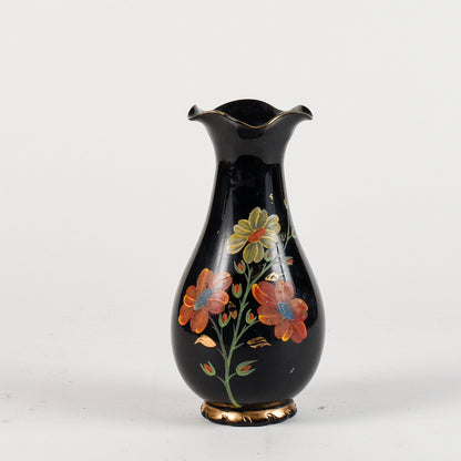 vaso nero con decoro floreale