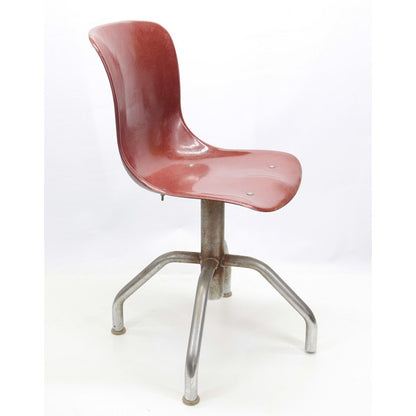 Sedia da ufficio anni 50 con seduta ergonomica in plastica rosso mattone