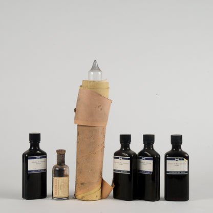 Set di bottigliette vintege ditta farmaceutica Geigy Suisse
