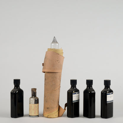 Set di bottigliette vintege ditta farmaceutica Geigy Suisse