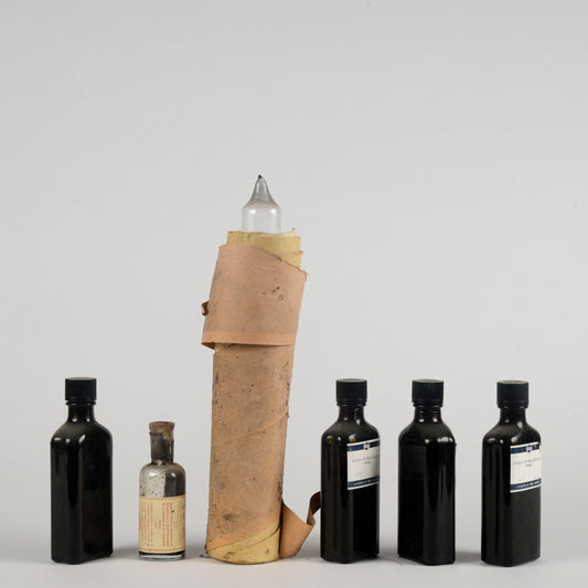 Set di bottigliette vintege ditta farmaceutica Geigy Suisse