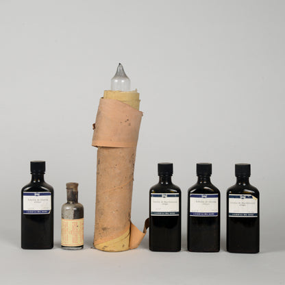 Set di bottigliette vintege ditta farmaceutica Geigy Suisse