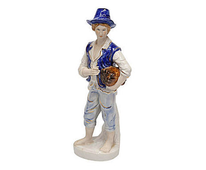 Statuina in ceramica uomo con cappello e  fascio di legna