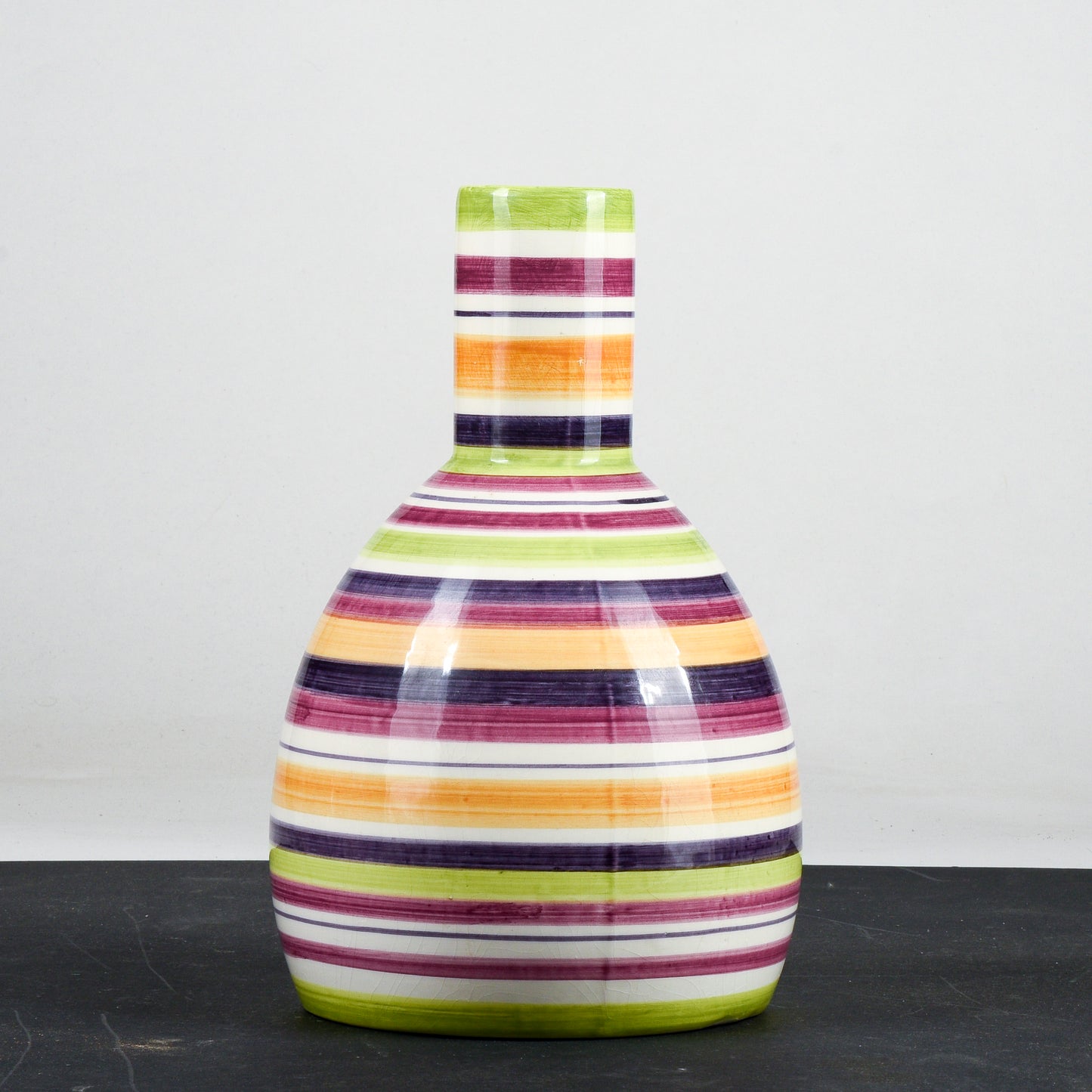 Vaso bottiglia in ceramica multicolore a righe con cerchi concentrici anni 1990