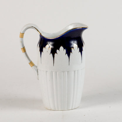 brocca in ceramica con decori oro e blu marcata S.C. Richard