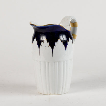 brocca in ceramica con decori oro e blu marcata S.C. Richard