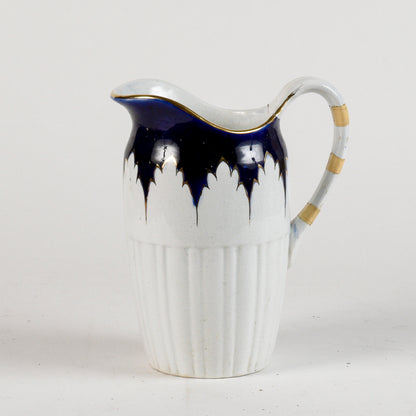 brocca in ceramica con decori oro e blu marcata S.C. Richard