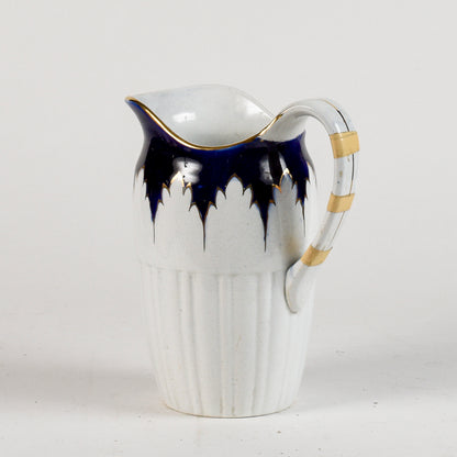 brocca in ceramica con decori oro e blu marcata S.C. Richard
