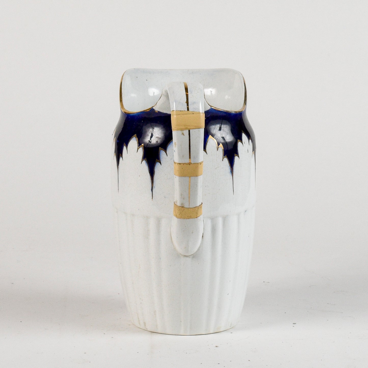 brocca in ceramica con decori oro e blu marcata S.C. Richard