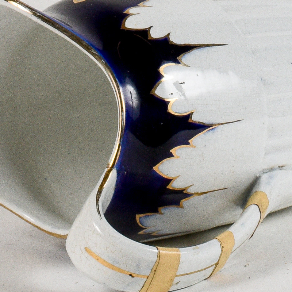 brocca in ceramica con decori oro e blu marcata S.C. Richard