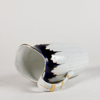 brocca in ceramica con decori oro e blu marcata S.C. Richard