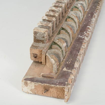 Cornice dentellata frammento decoro
