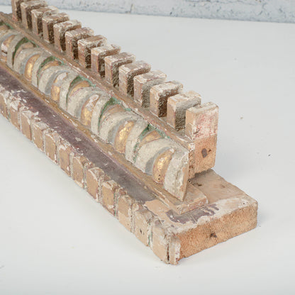 Cornice dentellata frammento decoro