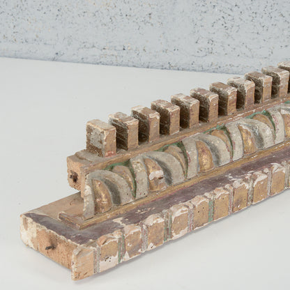 Cornice dentellata frammento decoro
