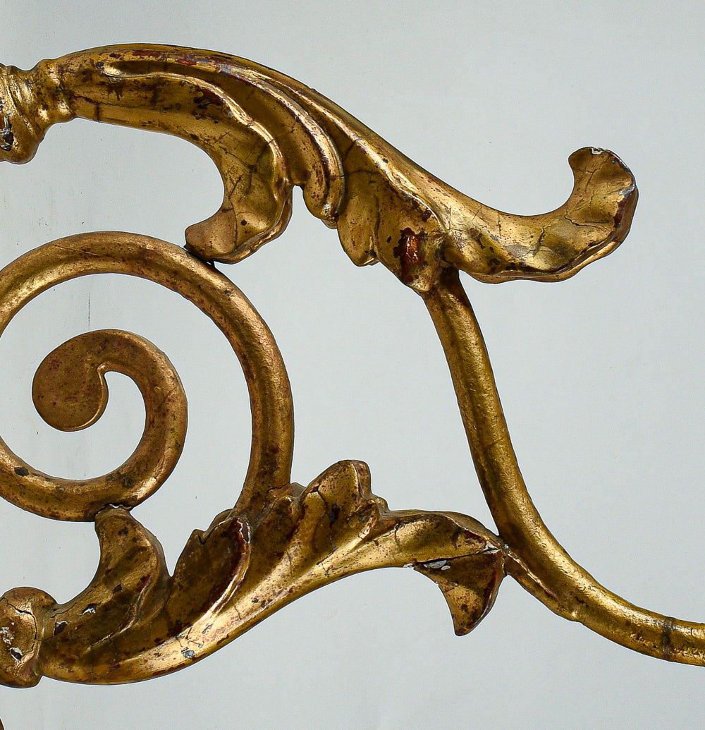 Coppia di applique torciere a muro in ferro lavorato con parti tornite in legno dorate  a foglia oro Italia  Luigi XV