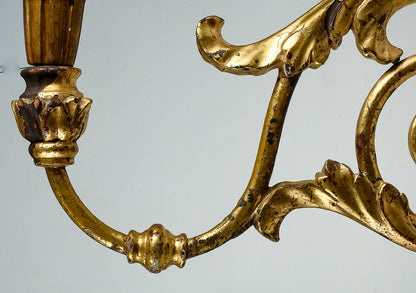 Coppia di applique torciere a muro in ferro lavorato con parti tornite in legno dorate  a foglia oro Italia  Luigi XV