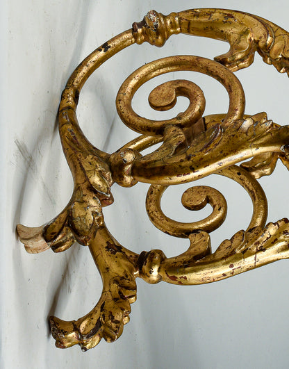 Coppia di applique torciere a muro in ferro lavorato con parti tornite in legno dorate  a foglia oro Italia  Luigi XV