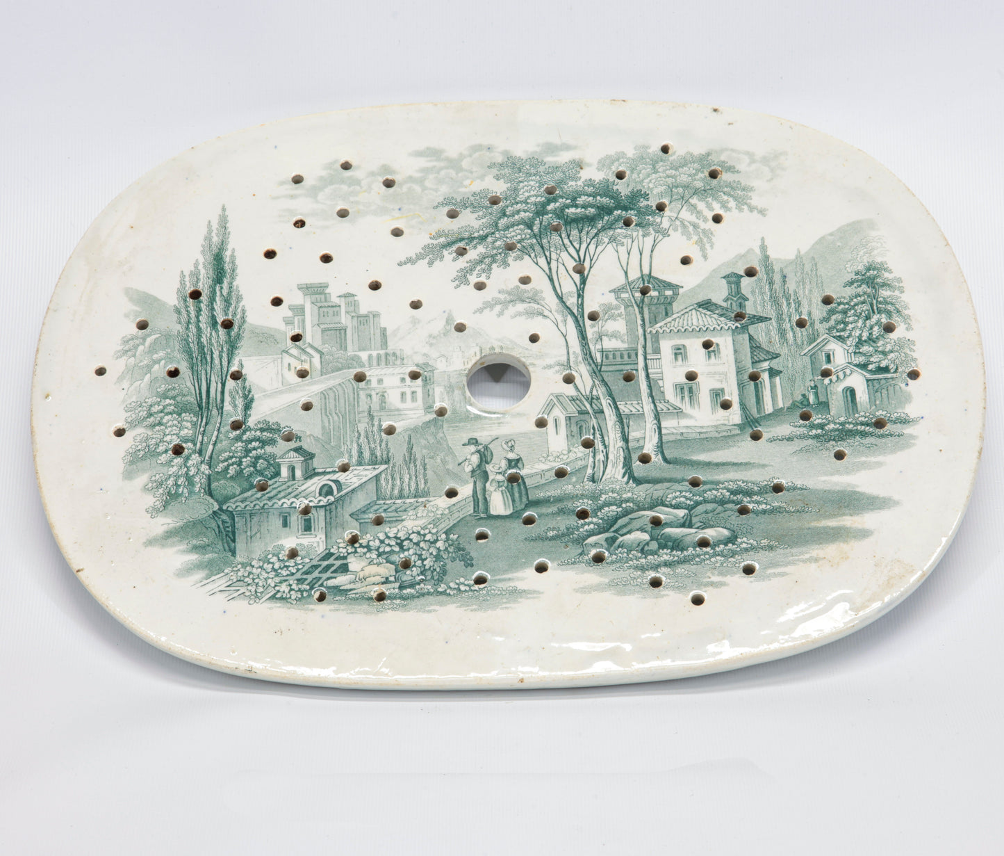 Piatto ovale sottopentola traforato in ceramica epoca fine IXI secolo
