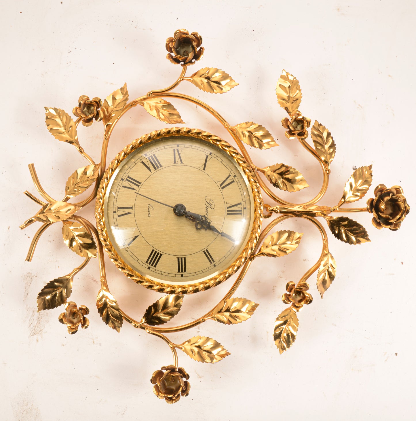 Orologio da parete Buvoli al Quarzo  in ottone con decori floreali