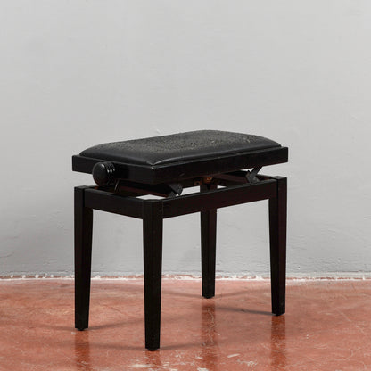 Sgabello da pianoforte laccato nero con seduta regolabile  Italia 1990