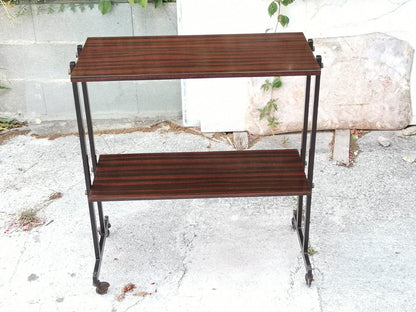Mobile carrello  portariviste etagere libreria  in  legno impellicciato e metallo con rotelle  Italia 1970