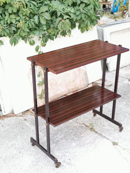 Mobile carrello  portariviste etagere libreria  in  legno impellicciato e metallo con rotelle  Italia 1970