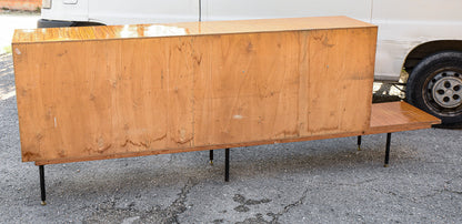 Credenza con sportello a ribalta decorato con foresta di bambù e tavolo penisola Italia 1960