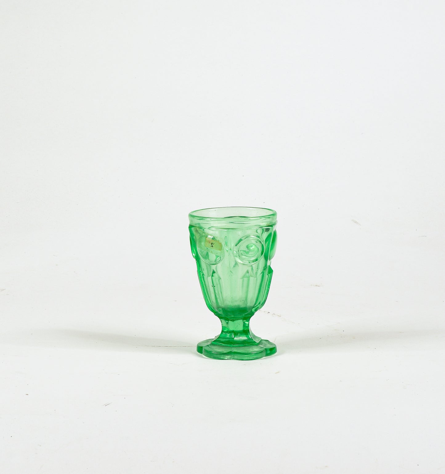 Bicchiere in  vetro lavorato  verde Italia epoca primo 900