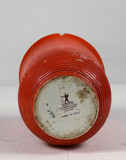 Vaso arancione con alcune riparazioni marcato Richard Ginory  sul fondo epoca 1940