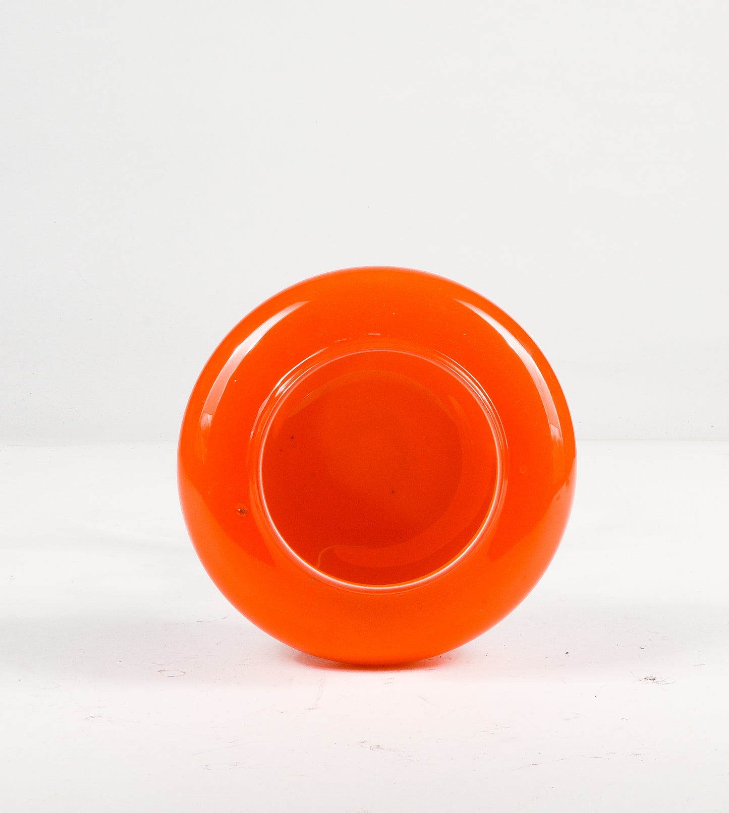 Vaso in vetro alzatina  arancione con gambo trasparente  lavorato Murano 1950